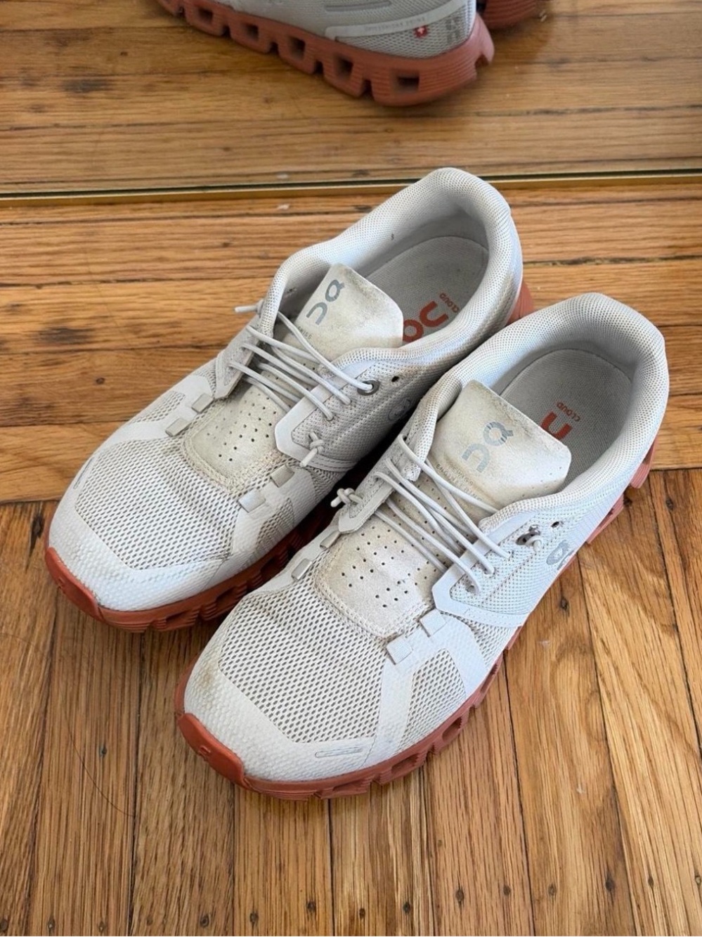 On Cloud white running shoes